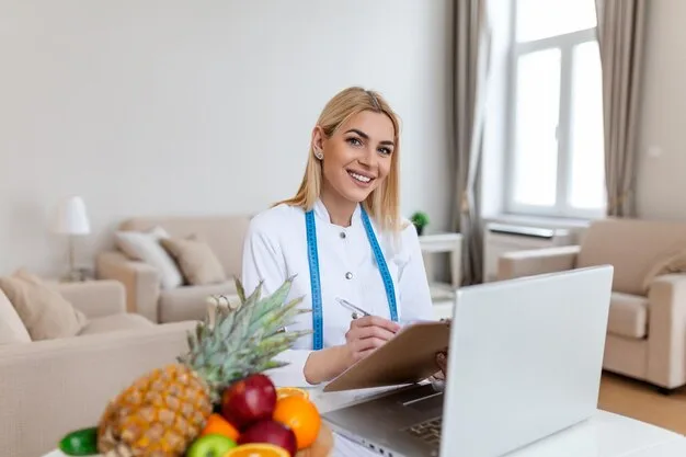 Cómo funcionan + modelos de examen de las pruebas libres de dietética en Cataluña 1 retrato joven nutricionista sonriente sala consulta escritorio nutricionista jugo fruta saludable cinta metrica dietista trabajando plan dieta 1212 5089 jpg